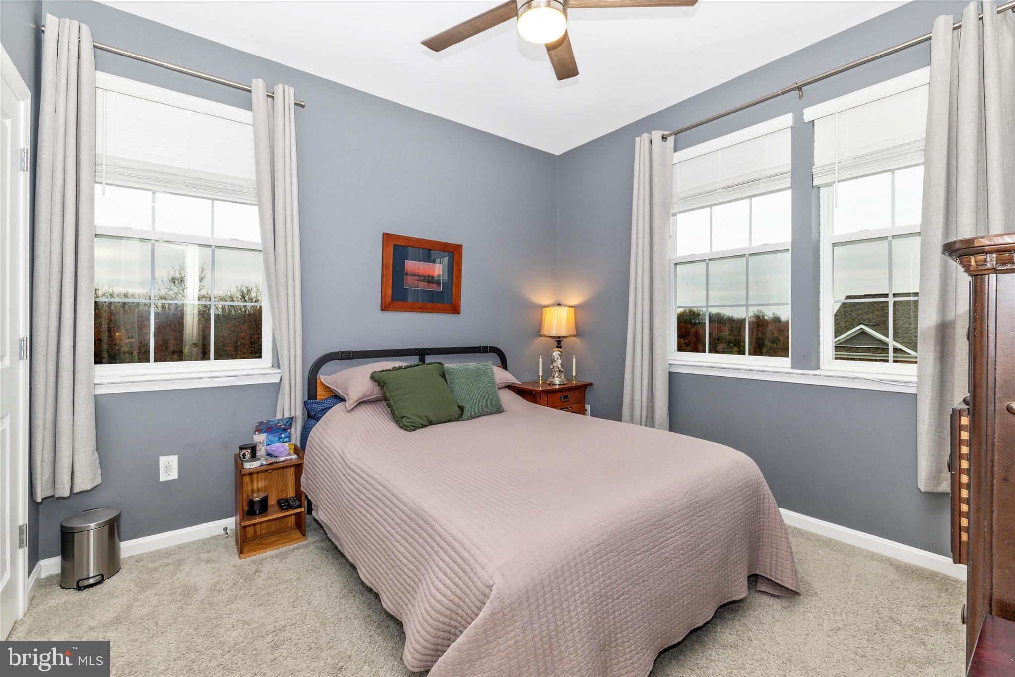 7001 Freedom Way Frederick, MD 21703 - Photo 35 of 65 a bedroom with a bed and a window