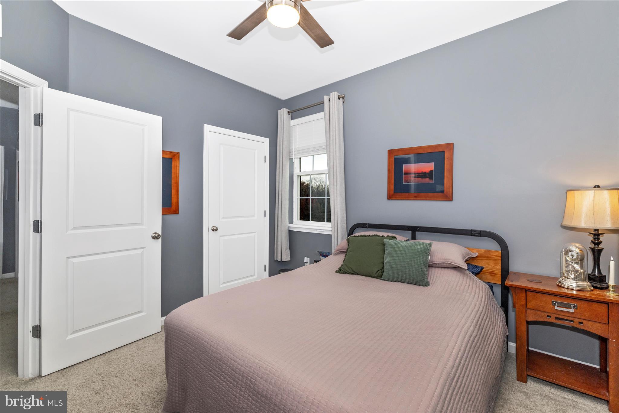 7001 Freedom Way Frederick, MD 21703 - Photo 36 of 65 a bedroom with a large bed and a closet