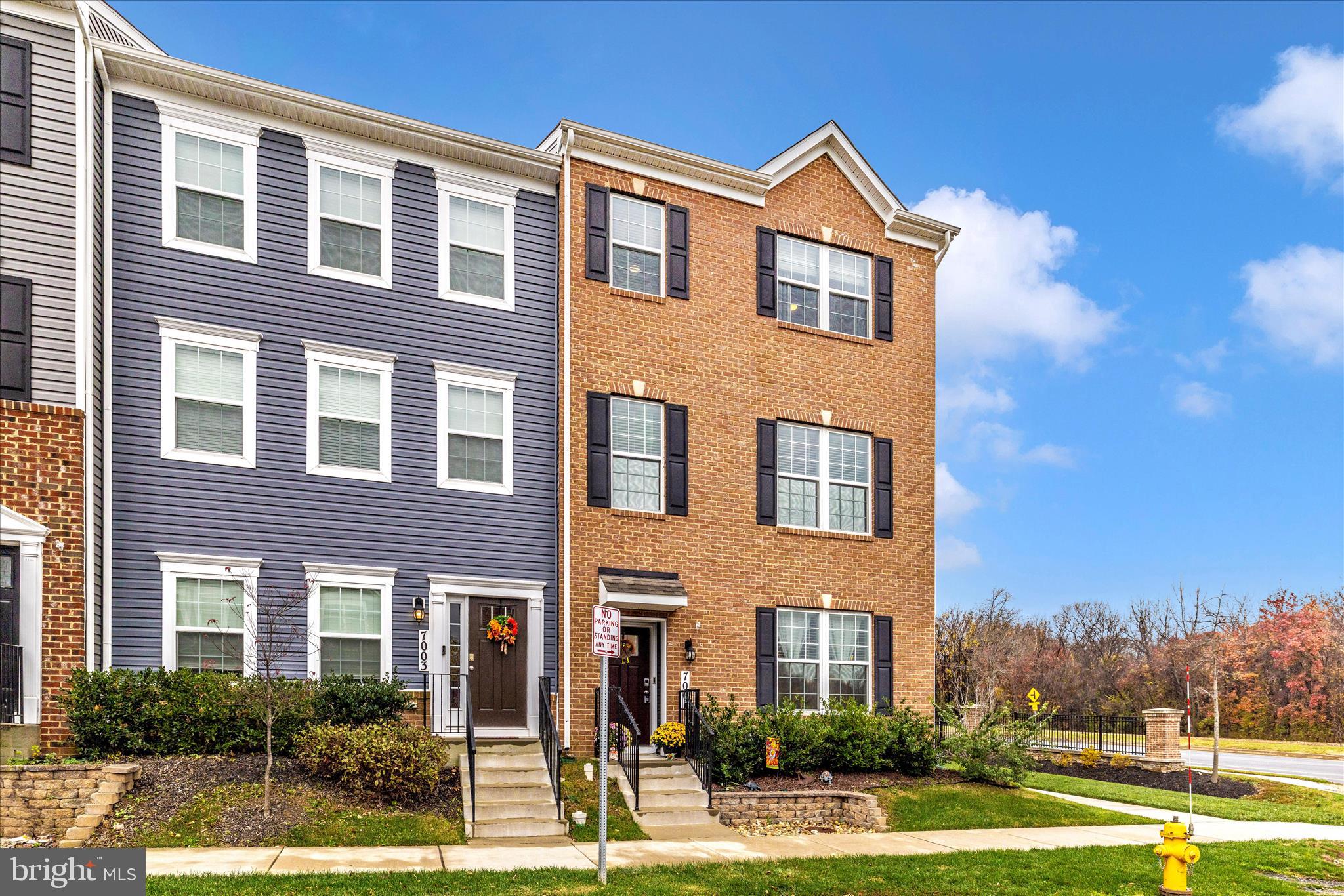 7001 Freedom Way Frederick, MD 21703 - Photo 40 of 65 a front view of a house with a yard