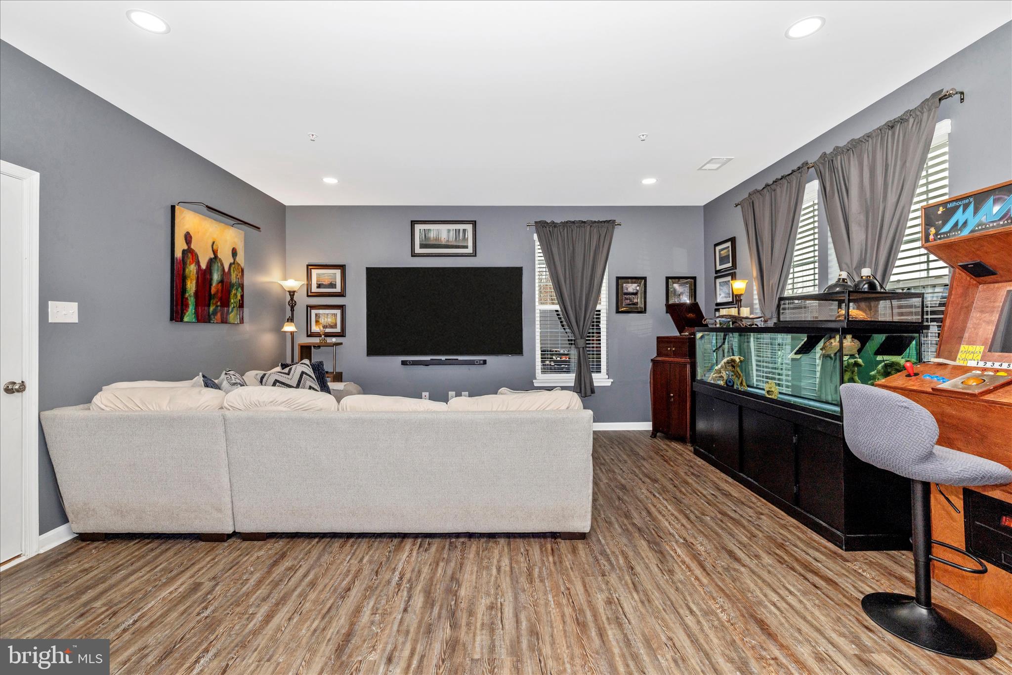 7001 Freedom Way Frederick, MD 21703 - Photo 5 of 65 a living room with furniture and a flat screen tv