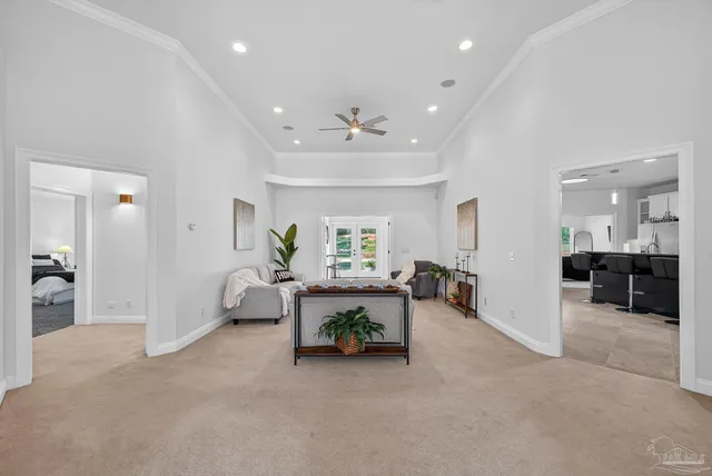 a bedroom with furniture and a window