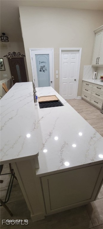 4030 27th Street Southwest Lehigh Acres, FL 33976 - Photo 3 of 7 a living room with a bed