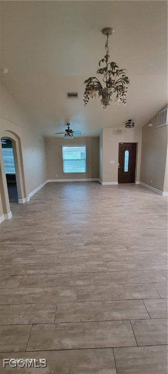 4030 27th Street Southwest Lehigh Acres, FL 33976 - Photo 4 of 7 a view of a hallway with a chandelier