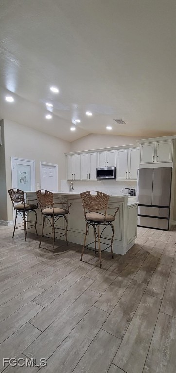4030 27th Street Southwest Lehigh Acres, FL 33976 - Photo 7 of 7 a view of a kitchen and dining room