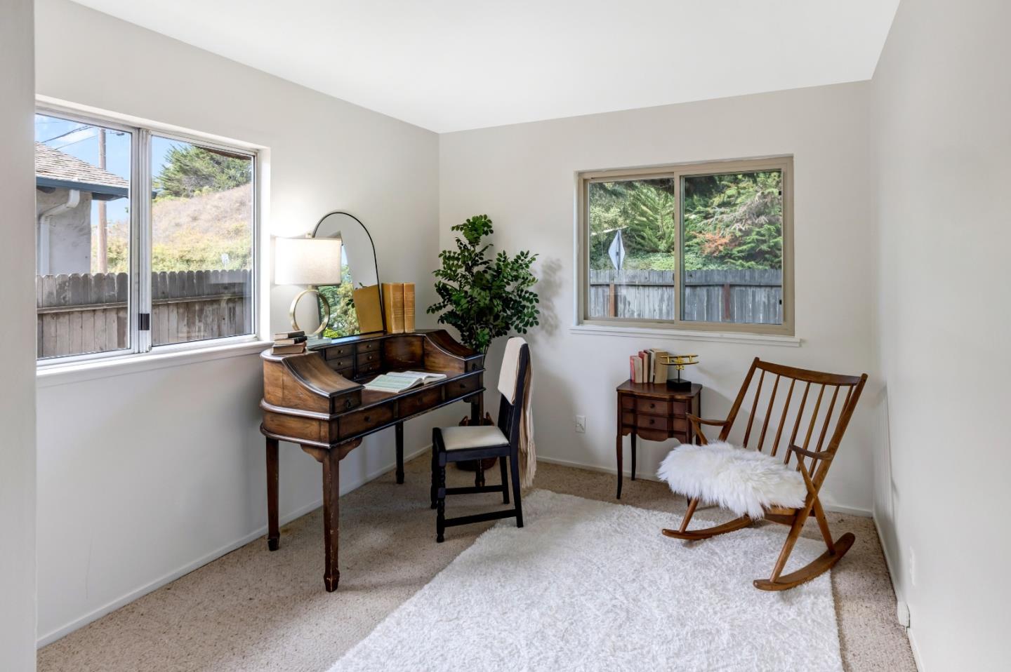 3370 Rio Road Carmel, CA 93923 - Photo 13 of 15 a living room with furniture and a window