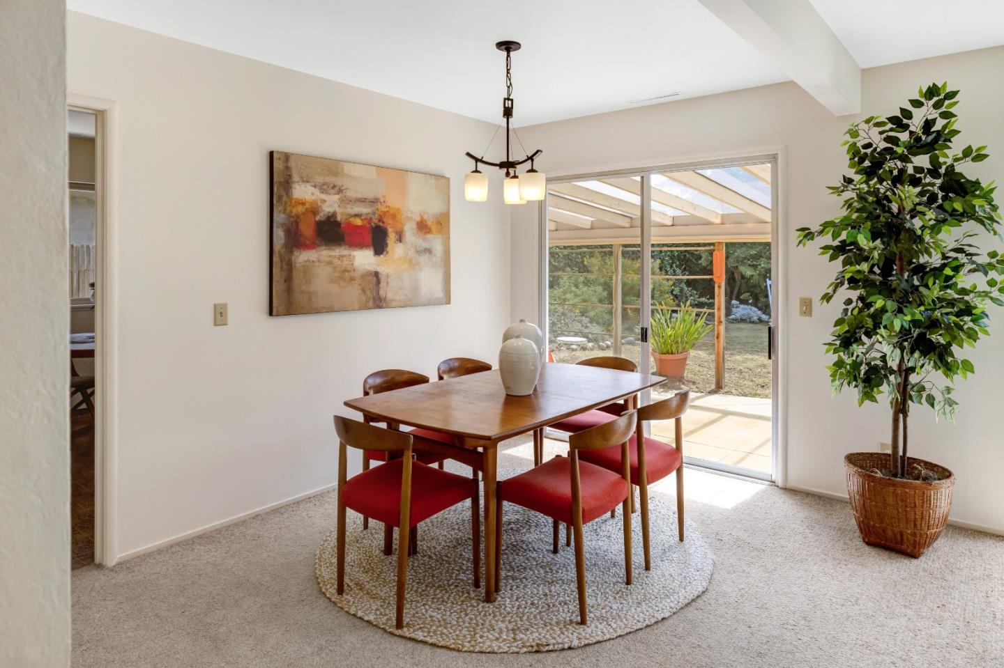 3370 Rio Road Carmel, CA 93923 - Photo 5 of 15 a dining room with furniture window and outside view