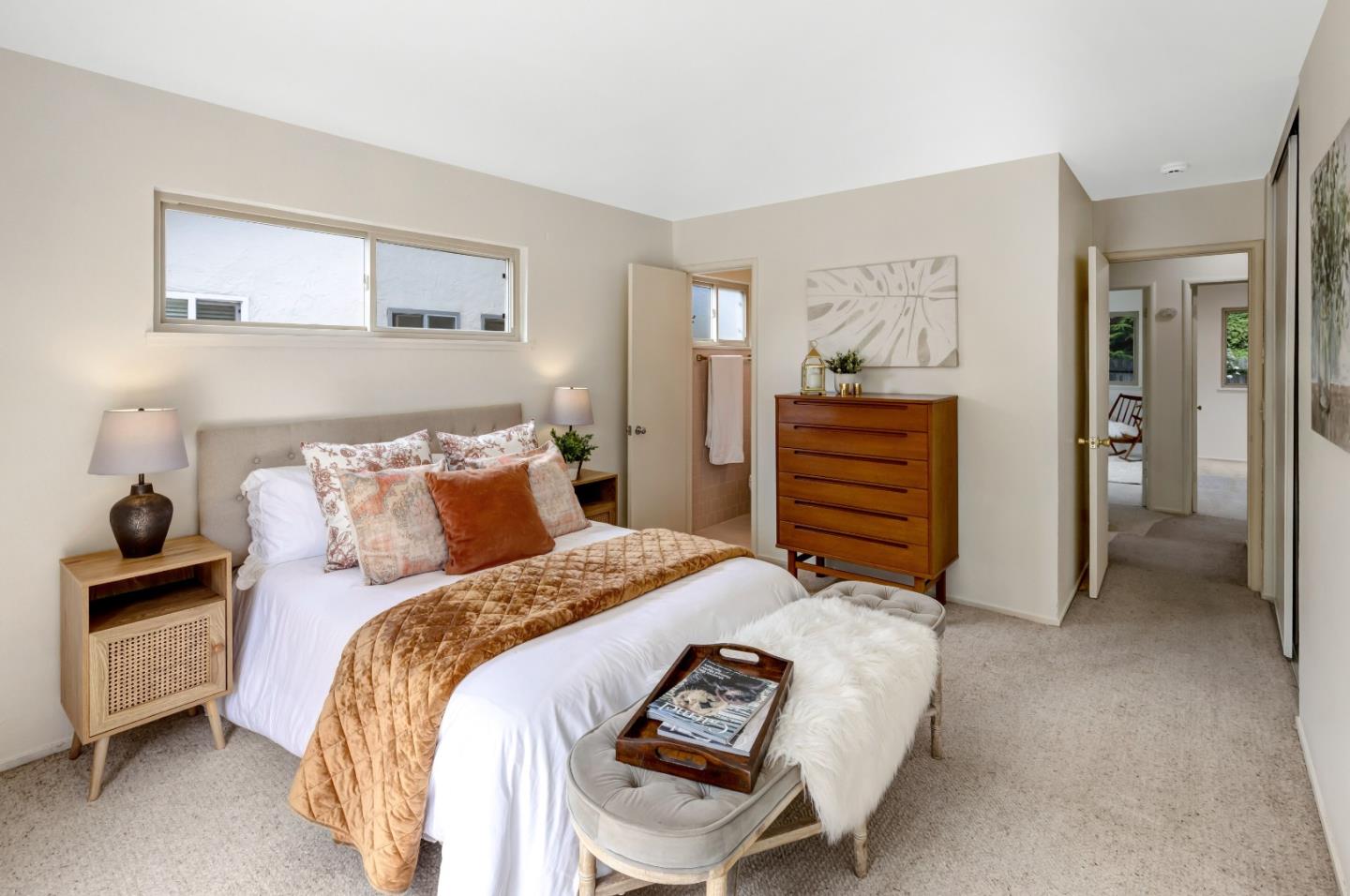 3370 Rio Road Carmel, CA 93923 - Photo 9 of 15 a bedroom with bed and a painting on the wall