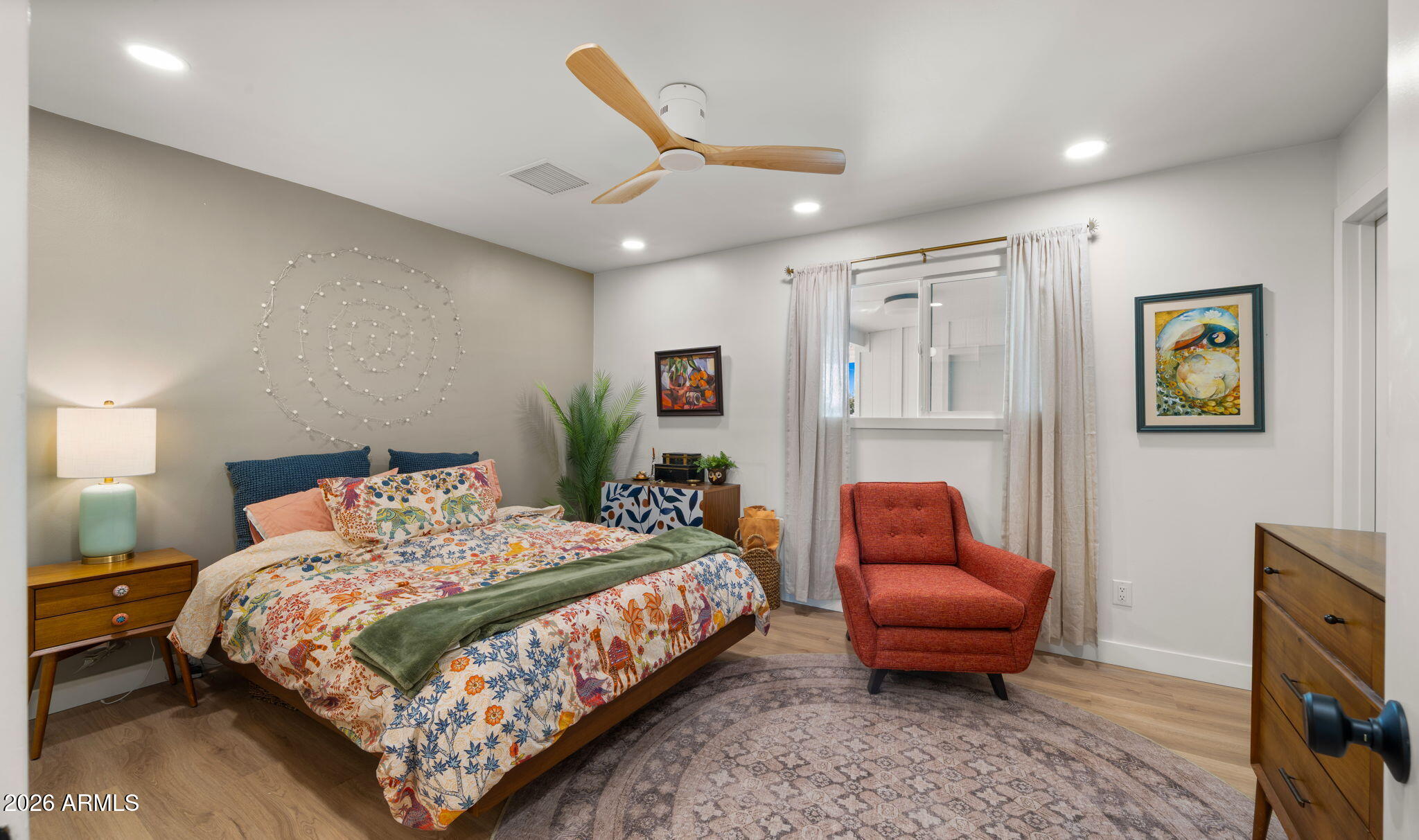 2115 North Normal Avenue Tempe, AZ 85288 - Photo 24 of 38 a bedroom with a bed and a couch