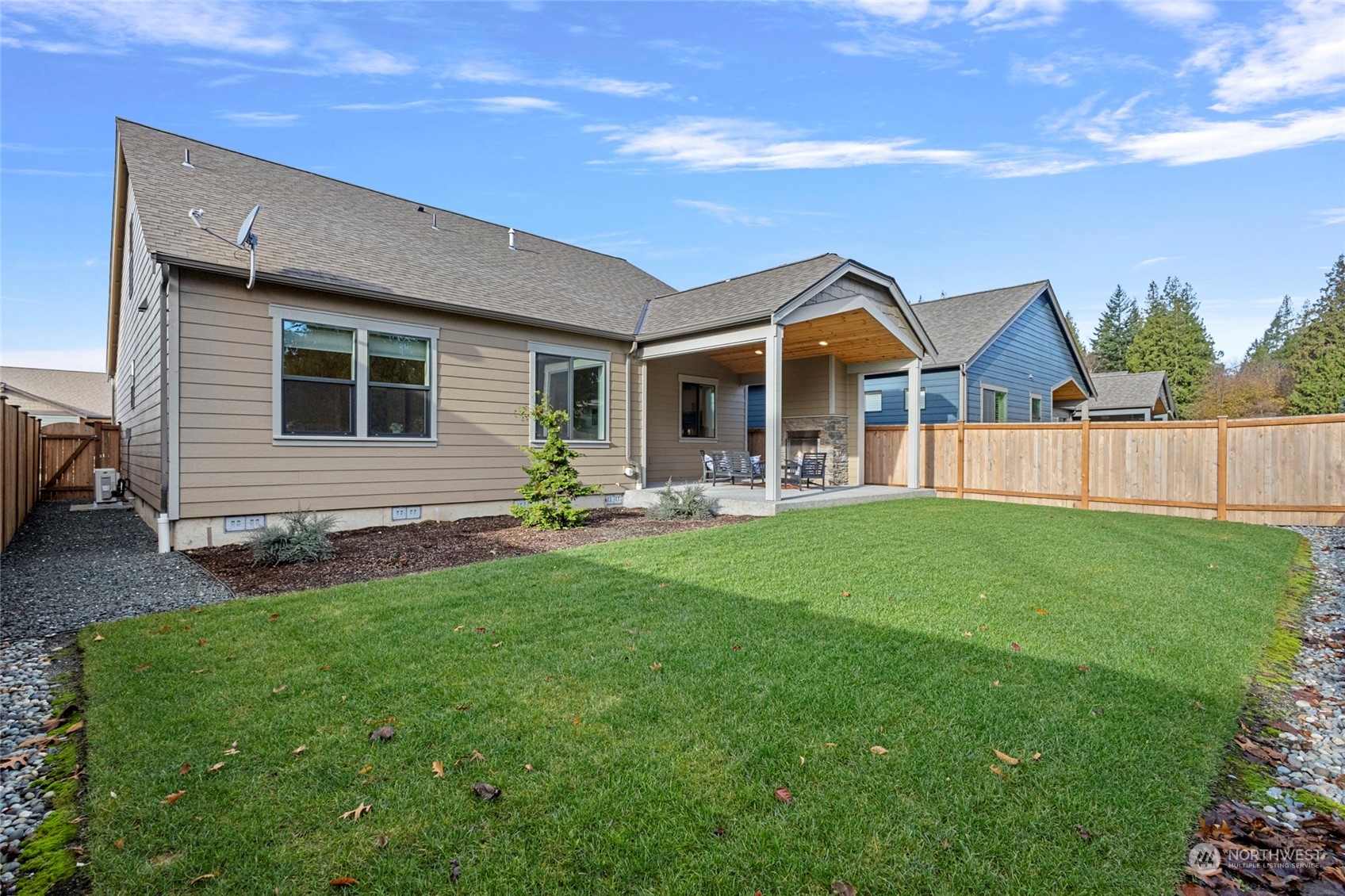 1379 Woods Point Loop Ferndale, WA 98248 - Photo 13 of 22 a front view of house with yard and green space