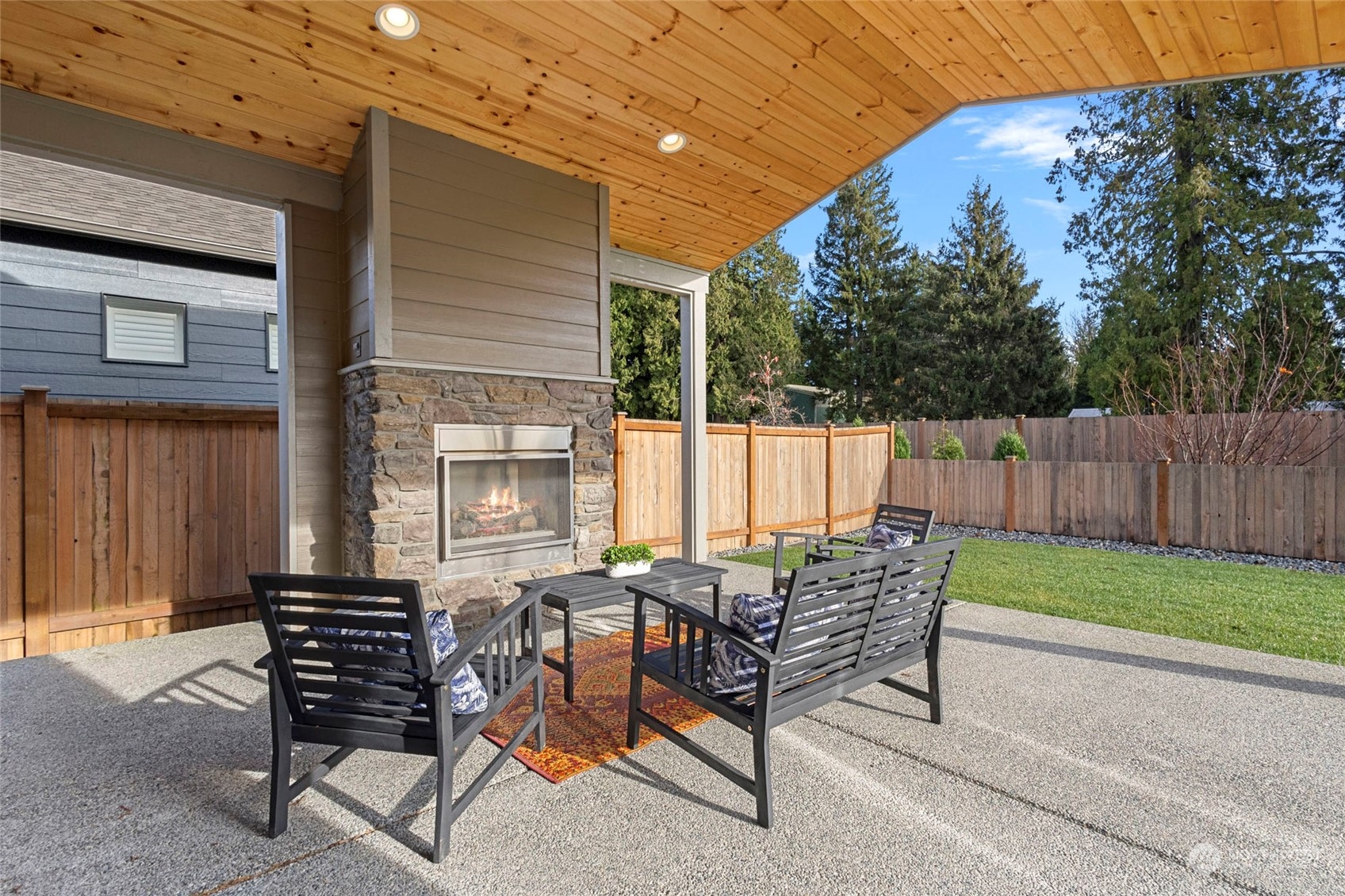 1379 Woods Point Loop Ferndale, WA 98248 - Photo 16 of 22 a view of a two chairs in the patio