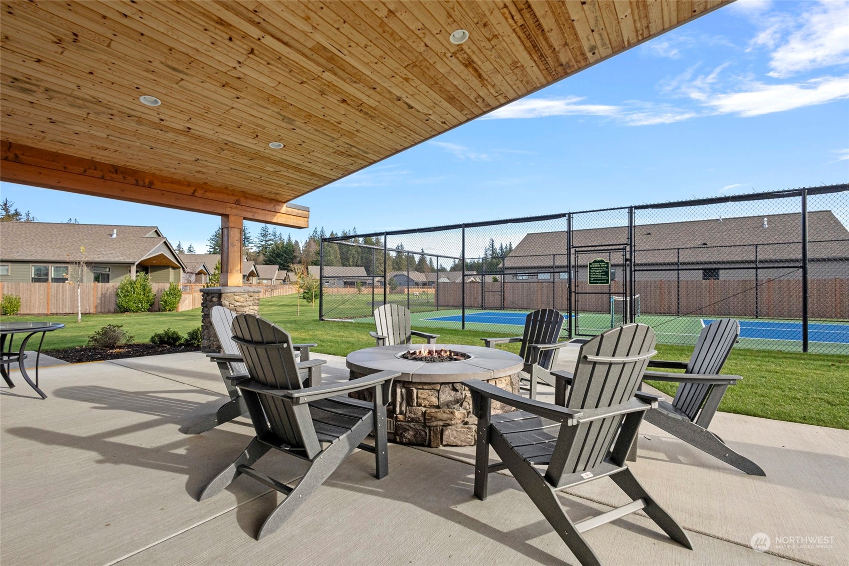 1379 Woods Point Loop Ferndale, WA 98248 - Photo 21 of 22 a table and chairs in the outdoor space