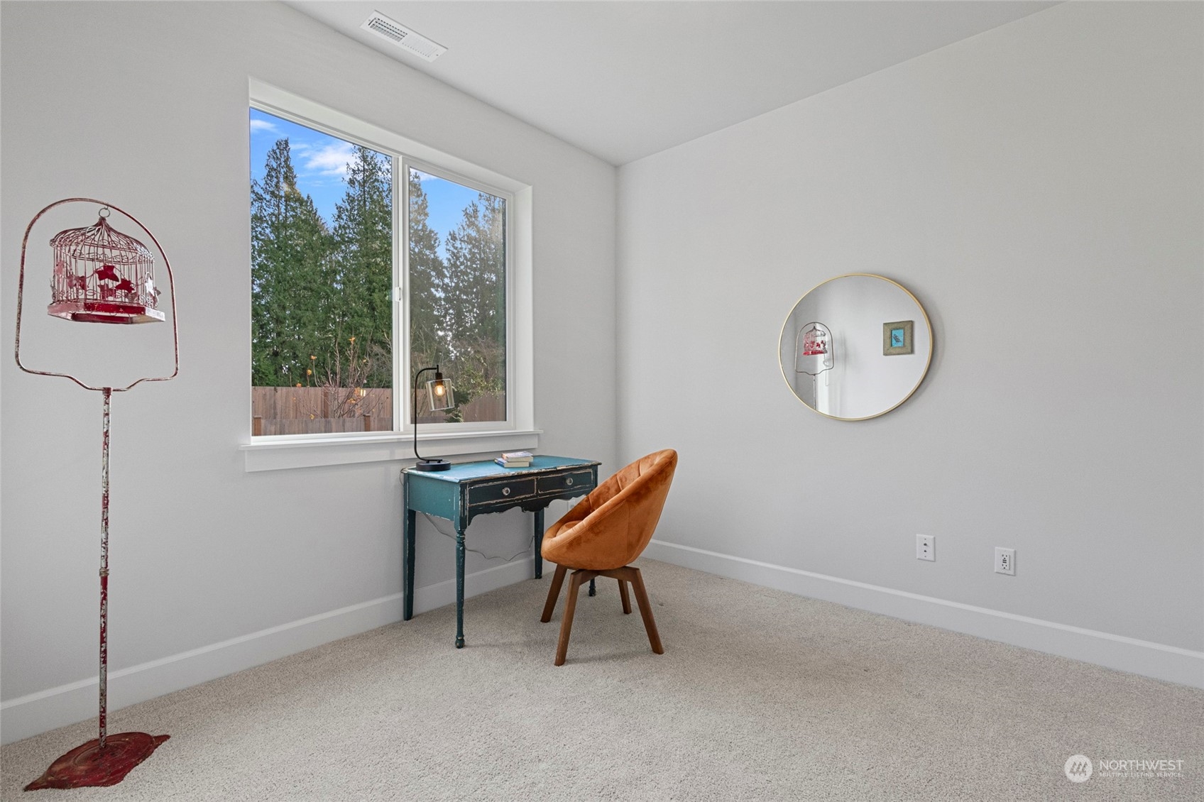 1379 Woods Point Loop Ferndale, WA 98248 - Photo 9 of 22 a view of a room with a window and a chair
