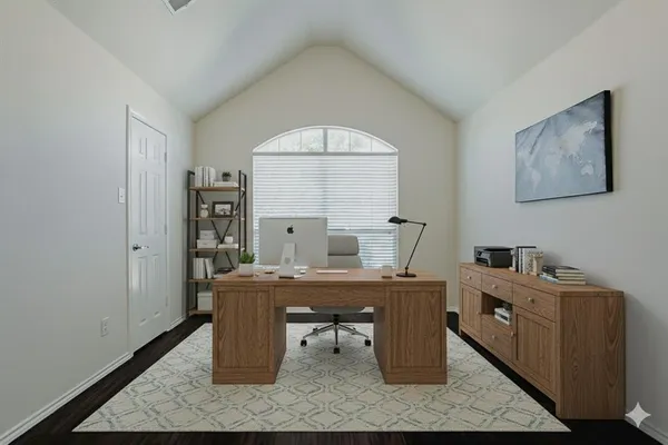 a view of a workspace with furniture