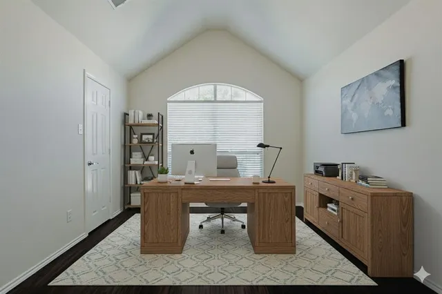 a view of a workspace with furniture