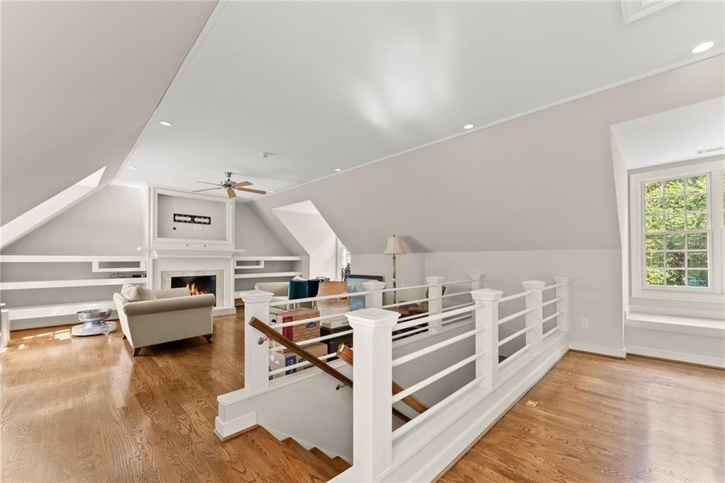 1885 Lake Warner Road Gainesville, GA 30501 - Photo 21 of 67 a view of a kitchen with furniture and wooden floor