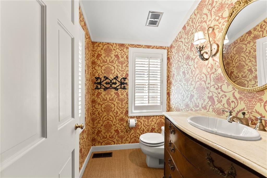 1885 Lake Warner Road Gainesville, GA 30501 - Photo 22 of 67 a bathroom with a sink toilet and shower