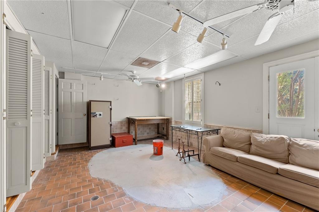 1885 Lake Warner Road Gainesville, GA 30501 - Photo 36 of 67 a living room with furniture and a chandelier