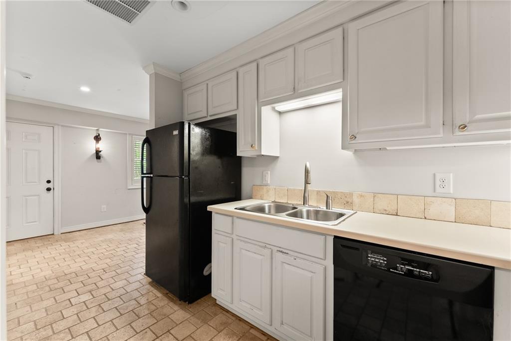 1885 Lake Warner Road Gainesville, GA 30501 - Photo 41 of 67 a kitchen with a sink and a refrigerator
