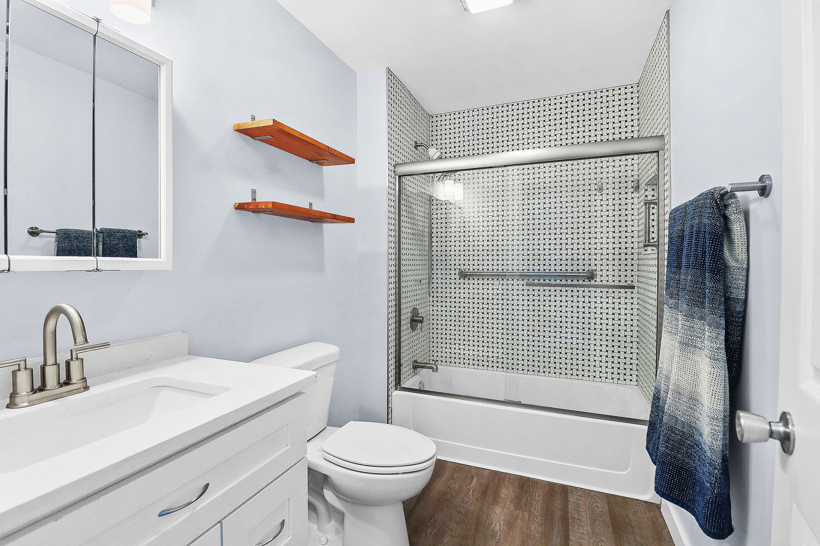 502 Monroe Avenue Ingleside, IL 60041 - Photo 13 of 20 a bathroom with a sink toilet and shower