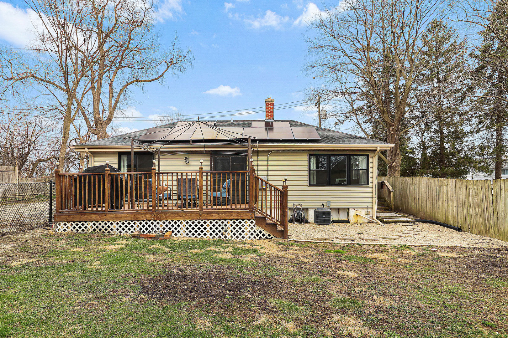 502 Monroe Avenue Ingleside, IL 60041 - Photo 16 of 20 a front view of a house with a yard outdoor seating and garage