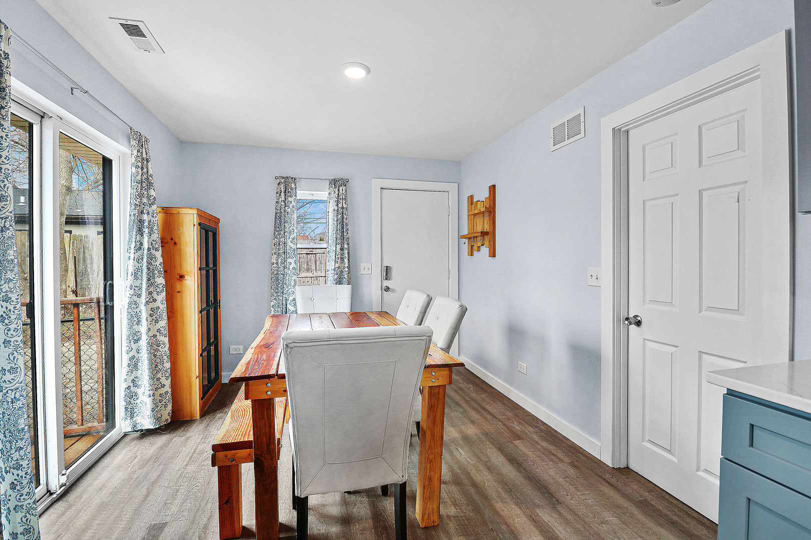 502 Monroe Avenue Ingleside, IL 60041 - Photo 7 of 20 a view of a dining room with furniture window and wooden floor