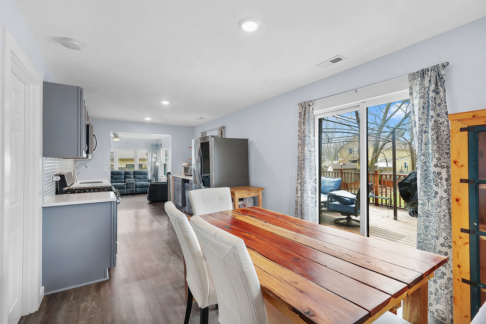 502 Monroe Avenue Ingleside, IL 60041 - Photo 8 of 20 a large kitchen with a table and chairs in it