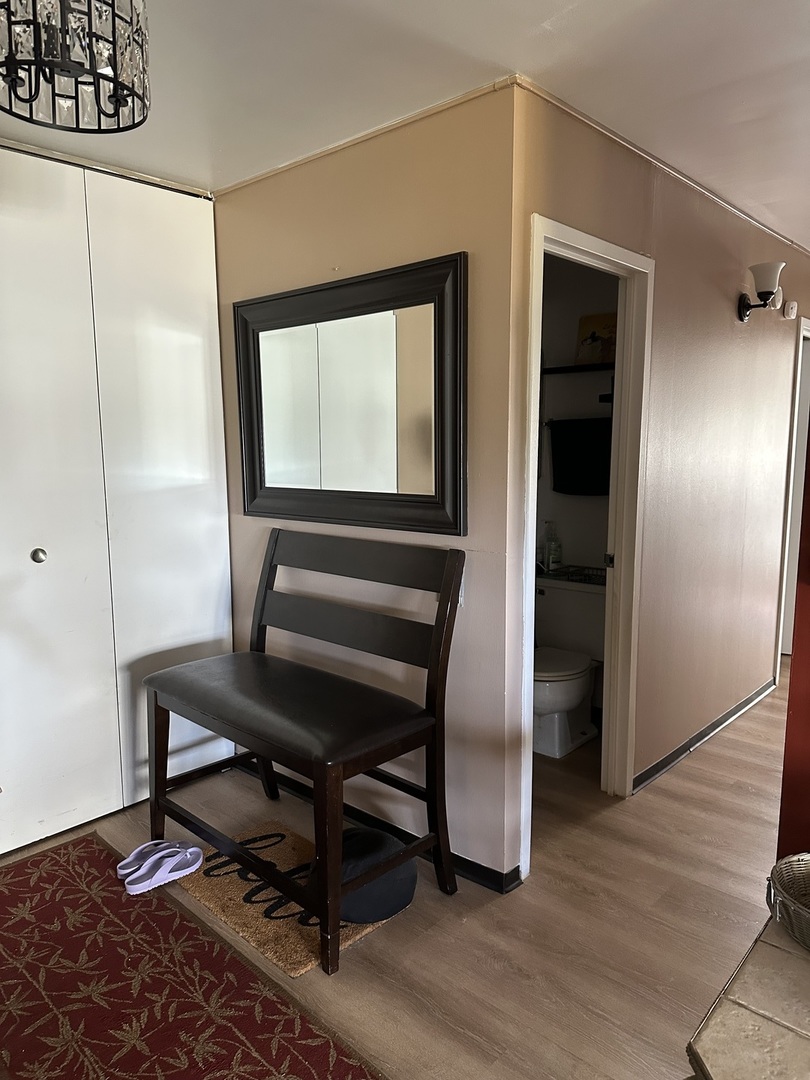 4850 South Lake Park Avenue, Unit 702B Chicago, IL 60615 - Photo 2 of 13 a view of a livingroom with furniture and a window
