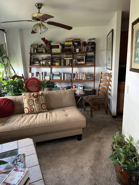 4850 South Lake Park Avenue, Unit 702B Chicago, IL 60615 - Photo 6 of 13 a living room with furniture and wooden floor
