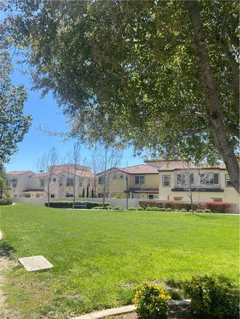 a view of a house with a big yard