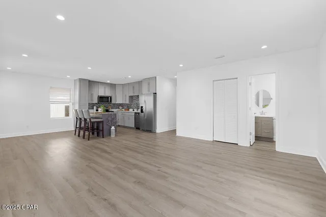 a kitchen with a table and chairs in it