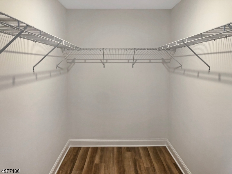 38 Old Shunpike Road, Unit B Randolph, NJ 07869 - Photo 13 of 18 a view of a room with racks on the wall