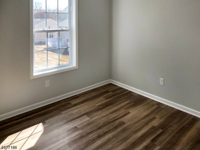 38 Old Shunpike Road, Unit B Randolph, NJ 07869 - Photo 14 of 18 a view of wooden floor