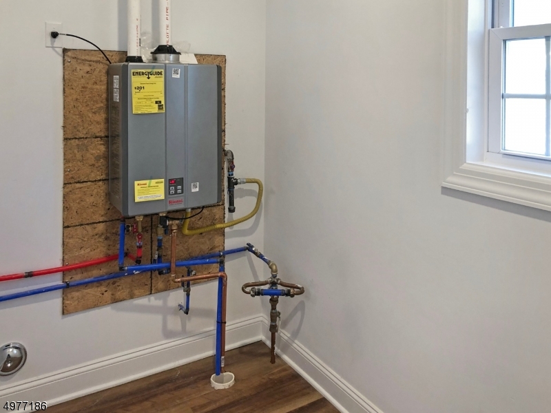 38 Old Shunpike Road, Unit B Randolph, NJ 07869 - Photo 9 of 18 a view of en suite bathroom with a small tub and window