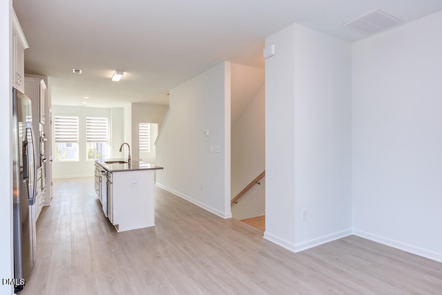 1949 Robin Hill Lane Raleigh, NC 27610 - Photo 16 of 39 a view of kitchen with furniture and wooden floor