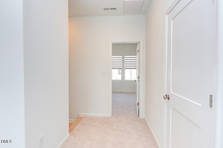 1949 Robin Hill Lane Raleigh, NC 27610 - Photo 22 of 39 a view of an empty room and a bathroom