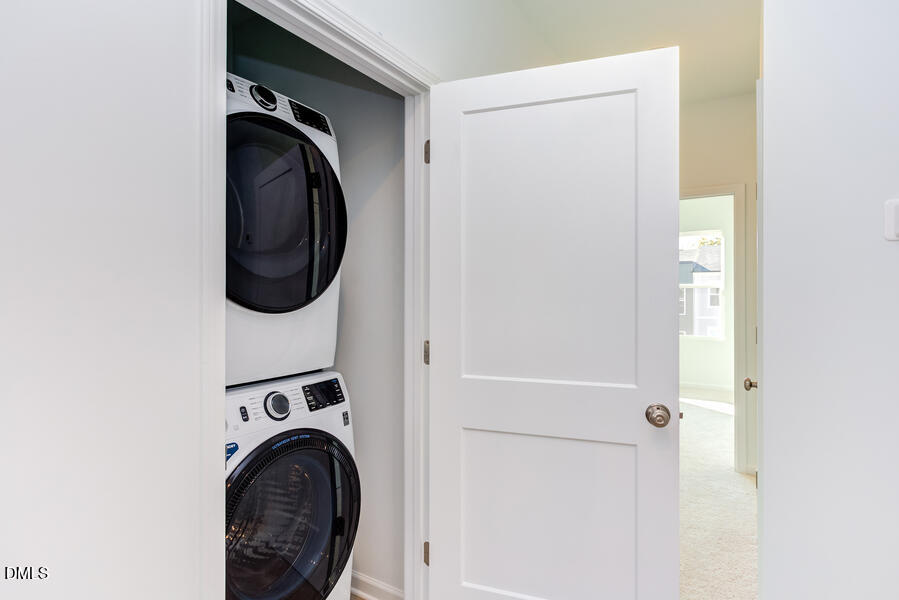 1949 Robin Hill Lane Raleigh, NC 27610 - Photo 23 of 39 a close view of a utility room with dryer and washer