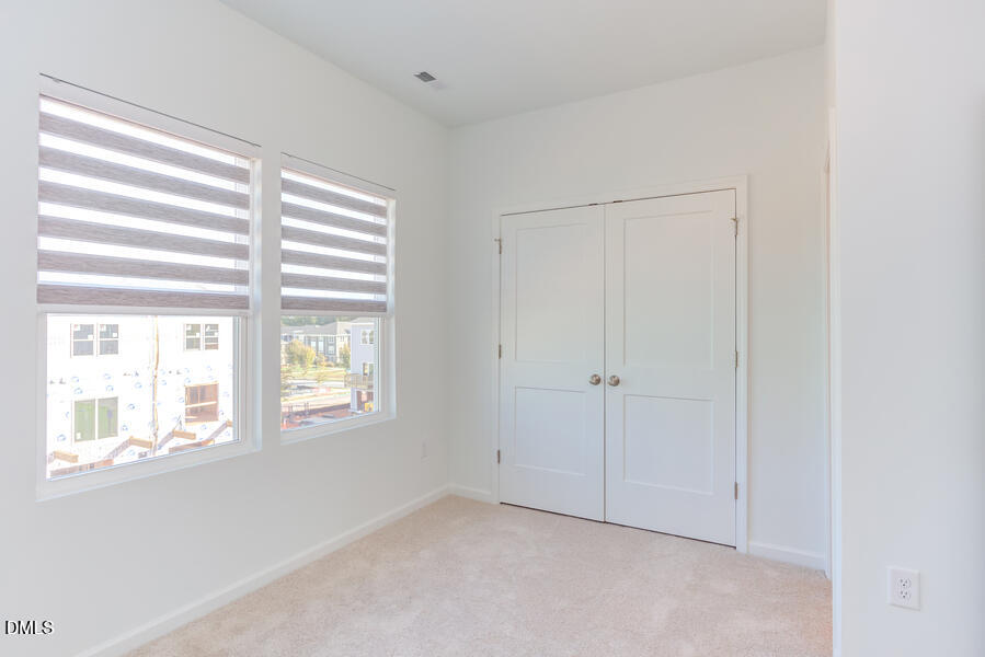 1949 Robin Hill Lane Raleigh, NC 27610 - Photo 24 of 39 a view of an empty room with a window
