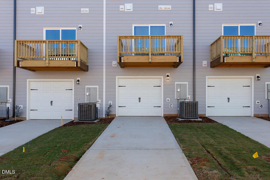 1949 Robin Hill Lane Raleigh, NC 27610 - Photo 38 of 39 a view of a kitchen with stainless steel appliances granite countertop a stove and cabinets