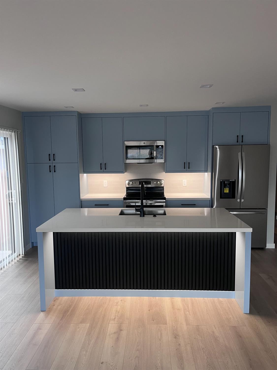 355 Sonoma Avenue Seaside, CA 93955 - Photo 2 of 32 a kitchen with a refrigerator and a stove top oven