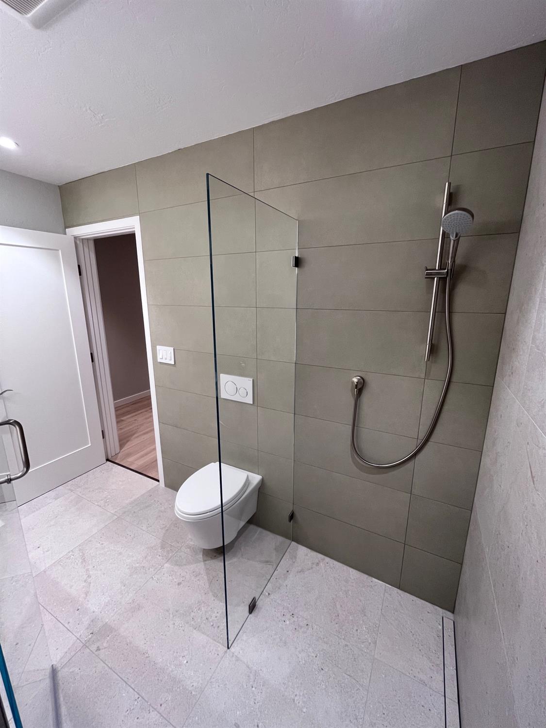 355 Sonoma Avenue Seaside, CA 93955 - Photo 31 of 32 a bathroom with a shower and a mirror