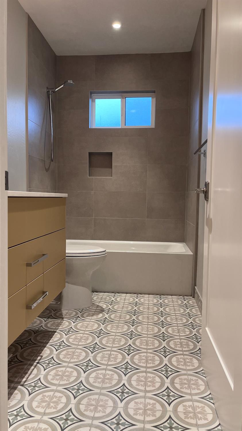 355 Sonoma Avenue Seaside, CA 93955 - Photo 5 of 32 a bathroom with a bathtub and a shower