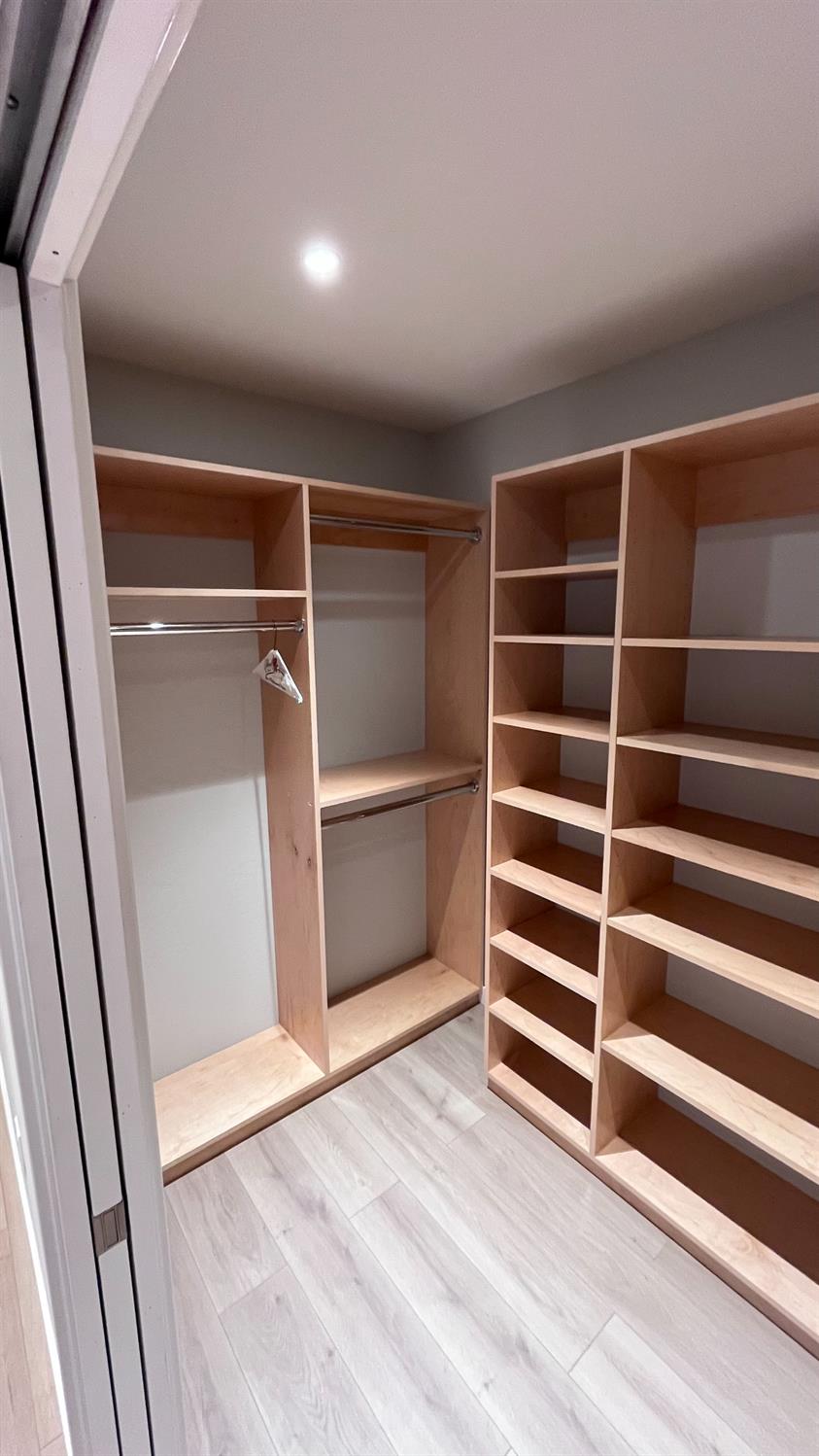 355 Sonoma Avenue Seaside, CA 93955 - Photo 9 of 32 a view of an empty room with wooden floor and windows