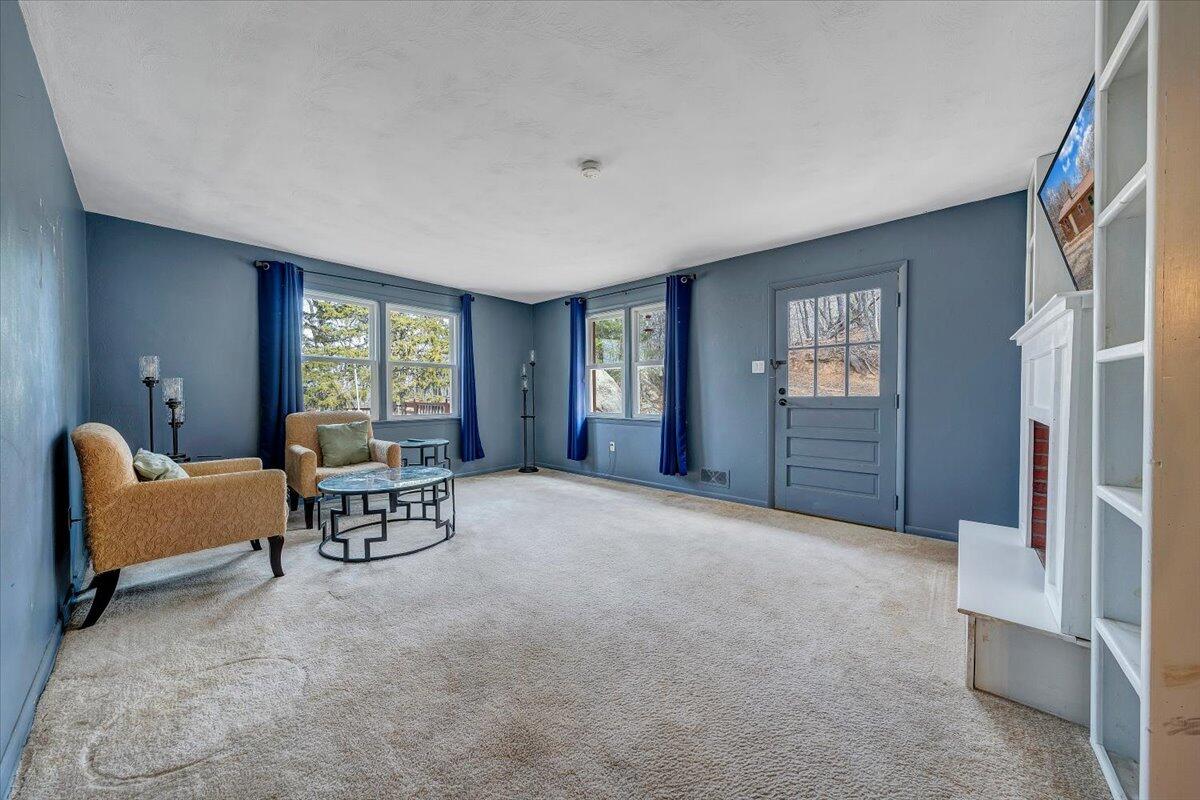 6847 Crowell Gap Road Boones Mill, VA 24065 - Photo 3 of 55 a living room with furniture and a window