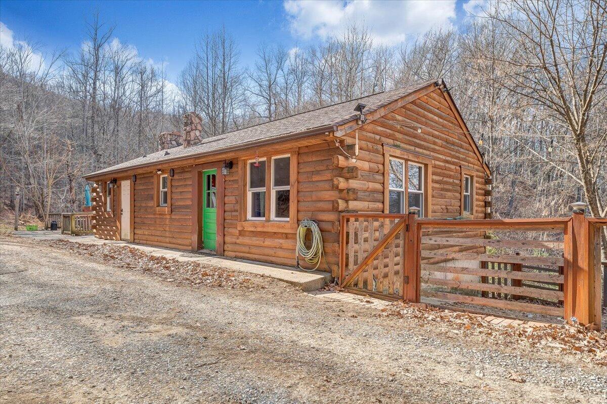 6847 Crowell Gap Road Boones Mill, VA 24065 - Photo 36 of 55 a view of a house with a yard