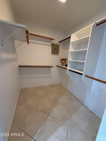 a bathroom with a double vanity sink and mirror