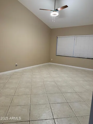 a view of a backyard with a chair