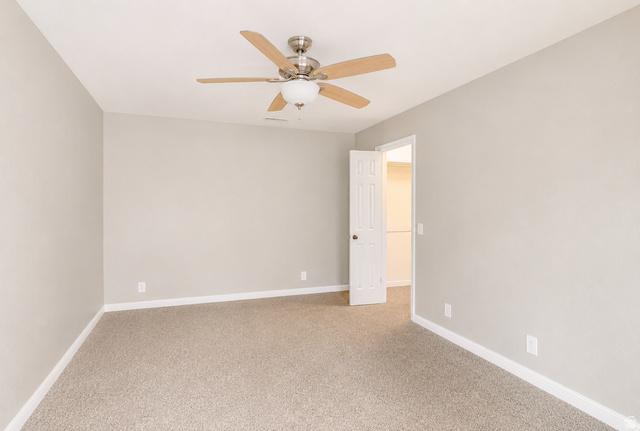 6907 South 745th Street East, Unit G Midvale, UT 84047 - Photo 12 of 30 Large primary suite with spacious walk-in closet