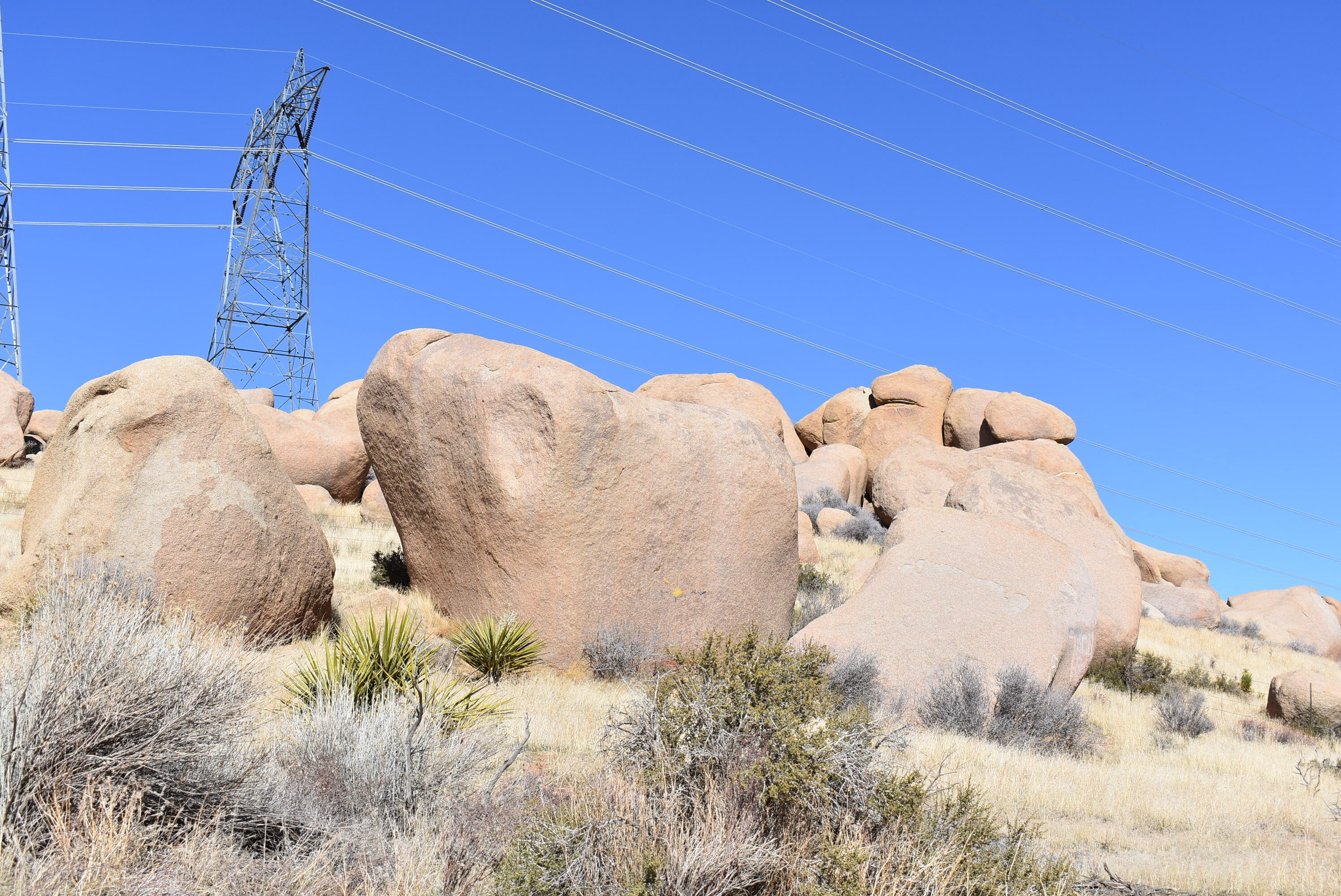 Andes Trail Apple Valley, CA 92308 - Photo 12 of 30 a bed with white sheets and pillows on it