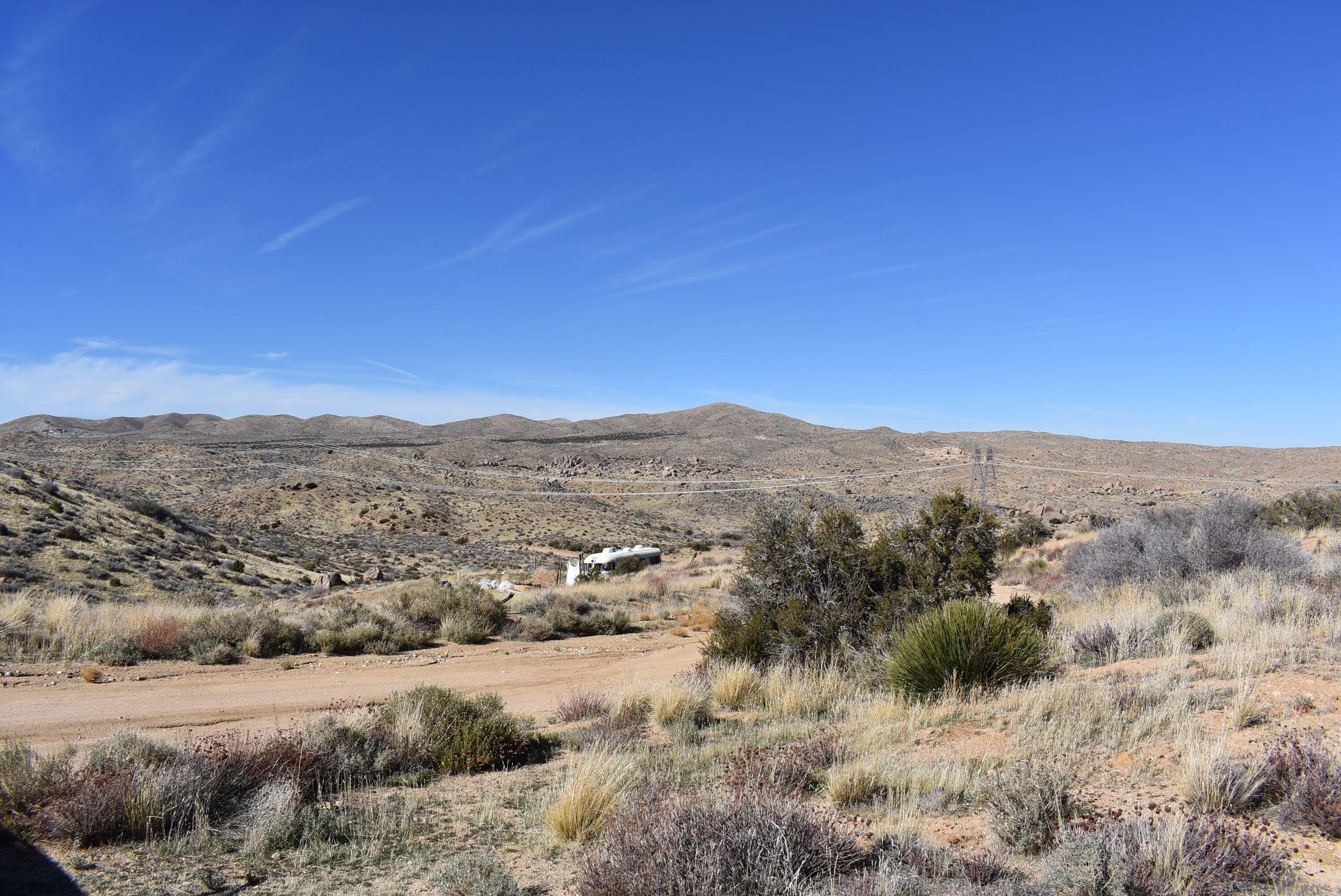Andes Trail Apple Valley, CA 92308 - Photo 14 of 30 a view of a dry field with mountains in the background