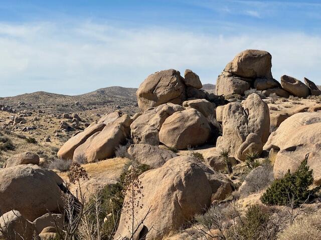 Andes Trail Apple Valley, CA 92308 - Photo 30 of 30 a bed with white sheets and pillows on it